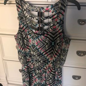 Cute cut out back romper with pockets!